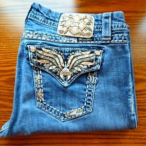 Miss Me Women's Mid Rise Easy Boot Jeans Size 32. Bling pockets with wings!